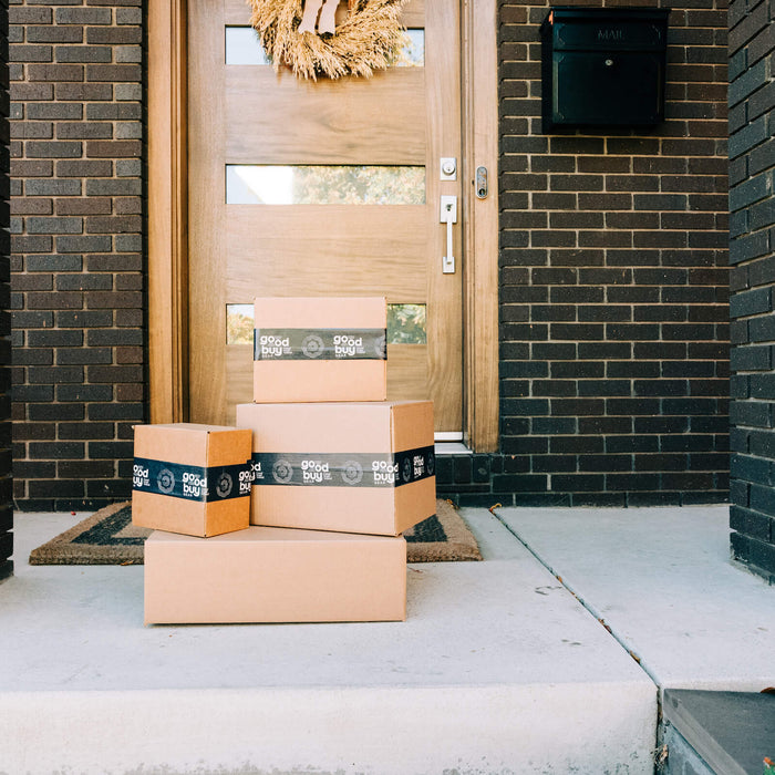 Goodbuy Gear Christmas packages on a doorstep