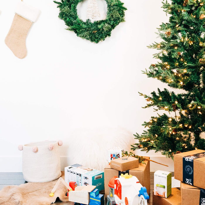 sustainable christmas presents under a christmas tree