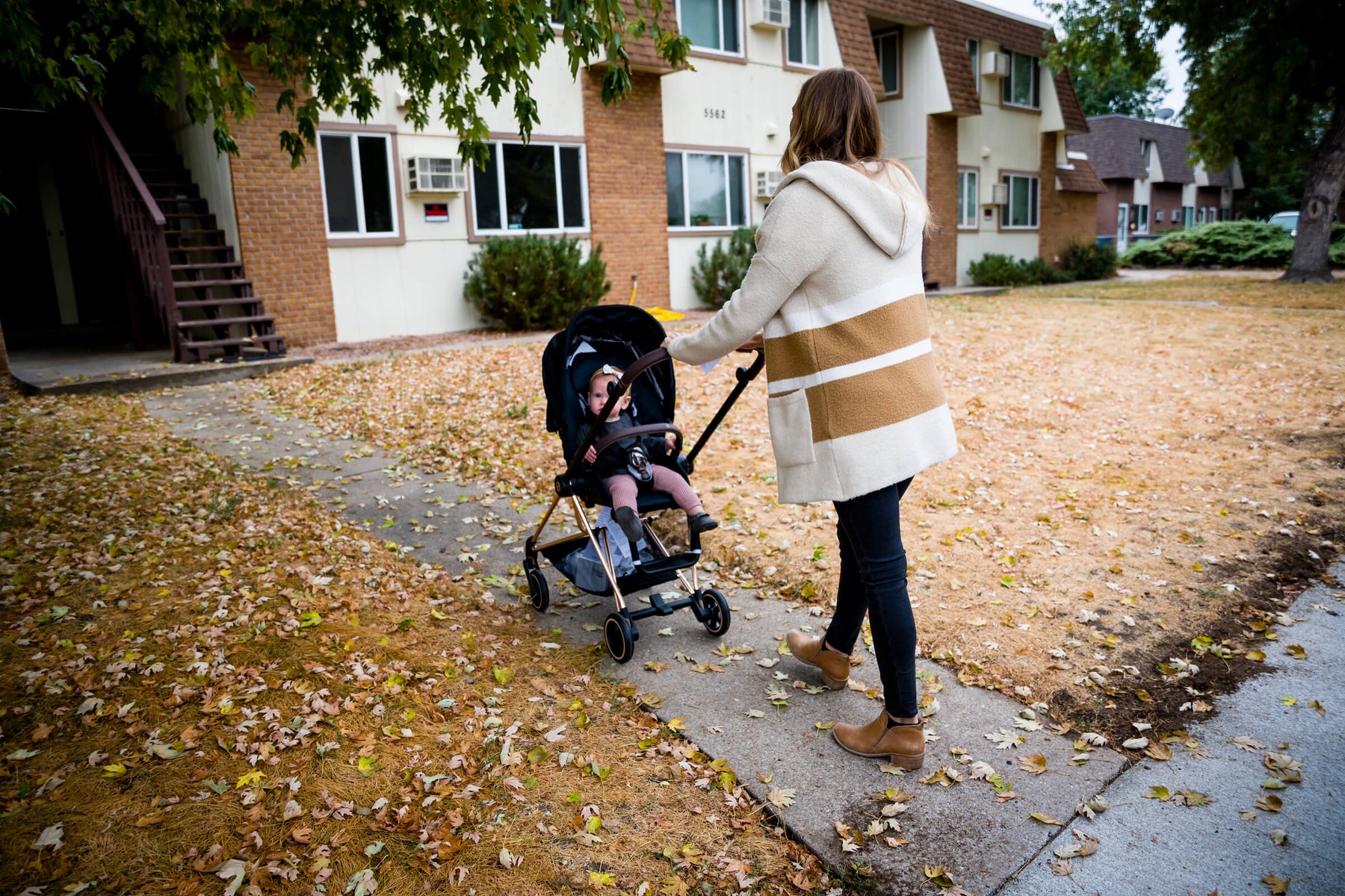 mom walking her baby with a used stroller