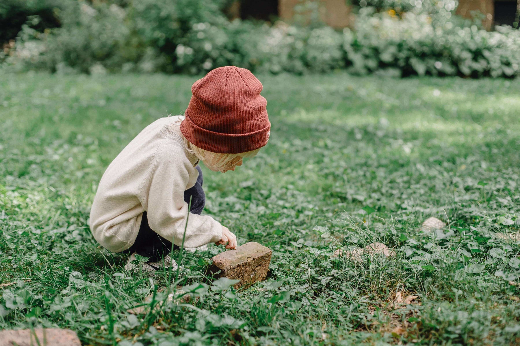 toddler exploring outdoors 