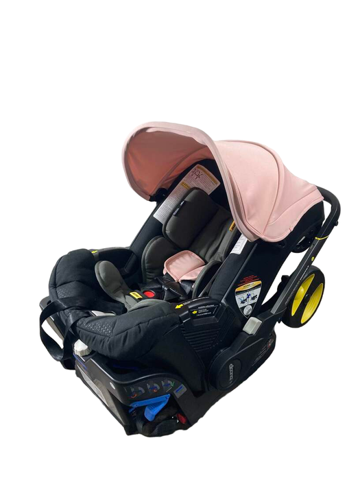 used Doona Infant Car Seat & Stroller Combo, 2023, Blush Pink