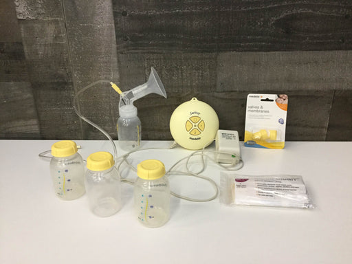 used Medela Swing Breast Pump Plus Accessories