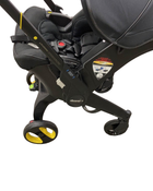 used Doona Infant Car Seat & Stroller Combo, Midnight Black, 2022