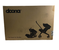 used Doona Infant Car Seat & Stroller Combo, 2022, Storm Grey