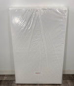 used Babyletto Pure Core Mini Crib Mattress with Cover