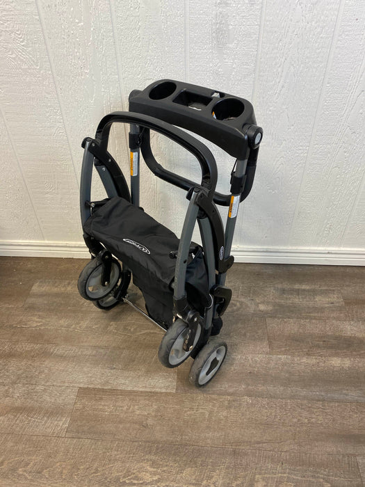 used Graco SnugRider Elite Infant Car Seat Frame Stroller