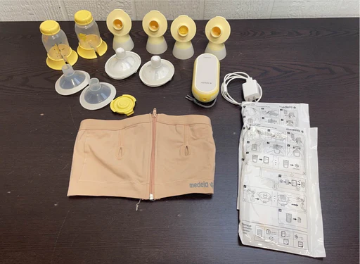 used Medela Freestyle Breast Pump, with Medium Hands Free Pumping Bra