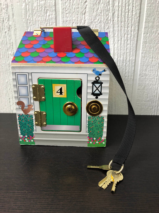 used Melissa & Doug Take-Along Wooden Doorbell Dollhouse