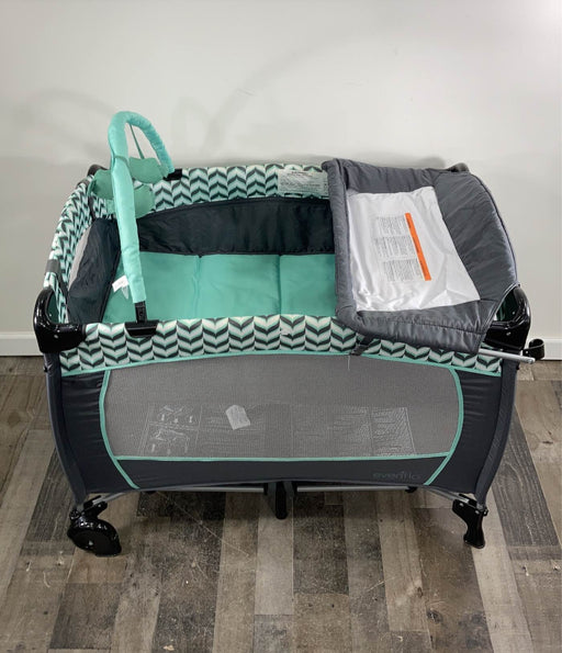 secondhand Evenflo Portable BabySuite Deluxe Playard