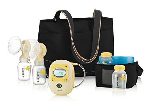 used Medela Freestyle Breast Pump, with accessories (24mm)