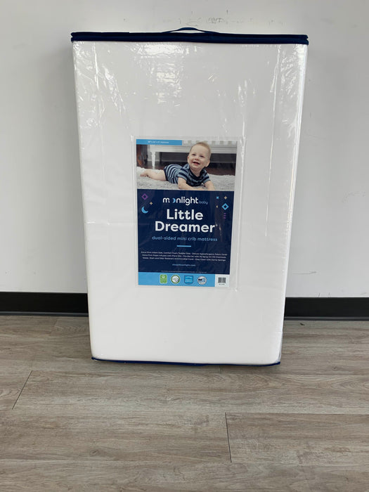 used Moonlight Slumber Little Dreamer Dual-Sided Mini Crib Mattress