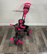 used Little Tikes 4-in-1 Deluxe Edition Baby Toddler Trike Tricycle, - neon pink & black