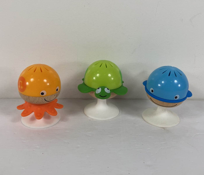 used Hape Put-Stay Rattle Set