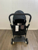 used Joovy Caboose Too Graphite Sit and Stand Double Stroller