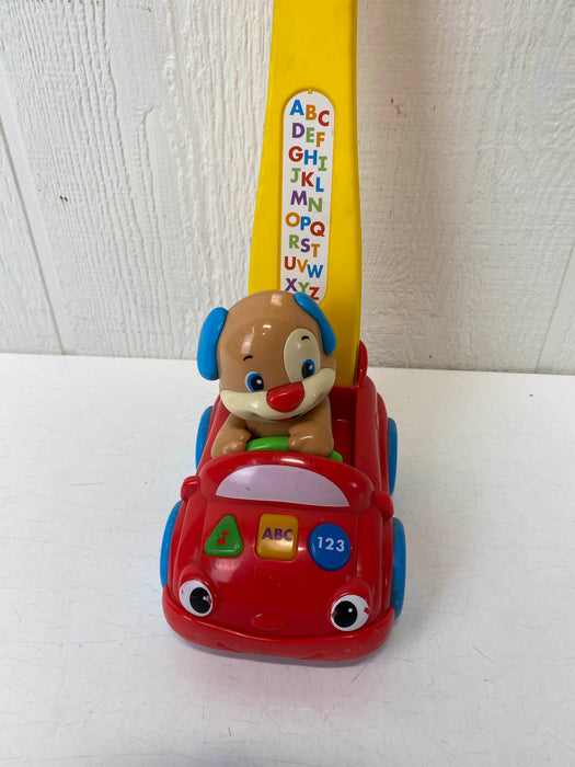 secondhand Fisher Price Laugh & Learn Puppy’s Smart Stages Push Car