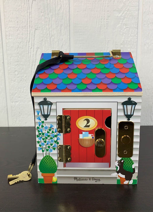 used Melissa & Doug Take-Along Wooden Doorbell Dollhouse