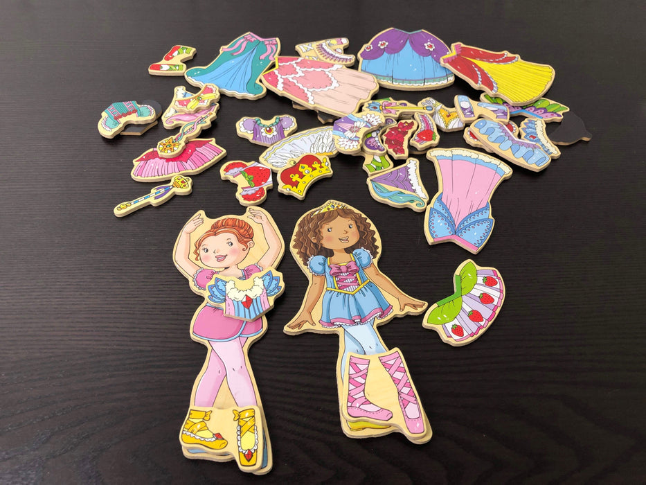 used T.S. Shure Daisy Girls Wooden Magnetic Dress-Up Dolls