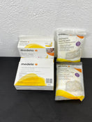 secondhand BUNDLE Medela Accessories, Quick clean micro-steam bags and disposable nursing pads