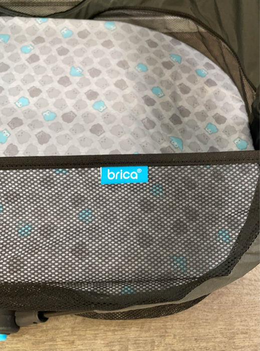 used Munchkin Brica Fold ‘n Go Travel Bassinet