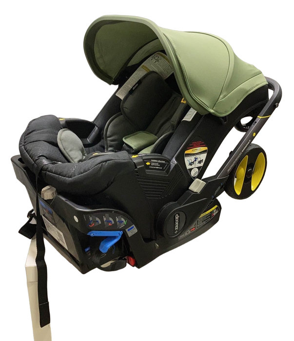 used Doona Infant Car Seat & Stroller Combo, 2022, Desert Green