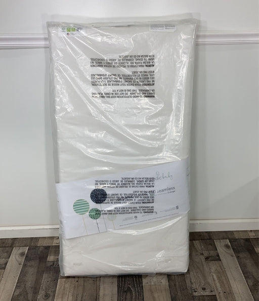 secondhand Naturepedic Classic 150 Seamless 2-stage Organic Baby & Toddler Mattress