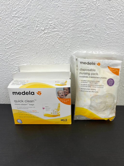 used BUNDLE Medela Accessories, Quick clean micro-steam bags and disposable nursing pads