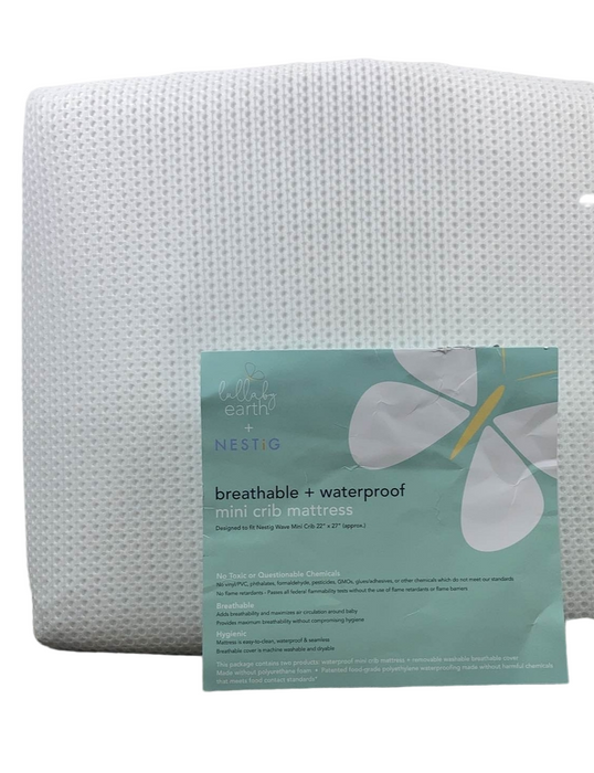 used Lullaby Earth Breeze Mini Crib Mattress