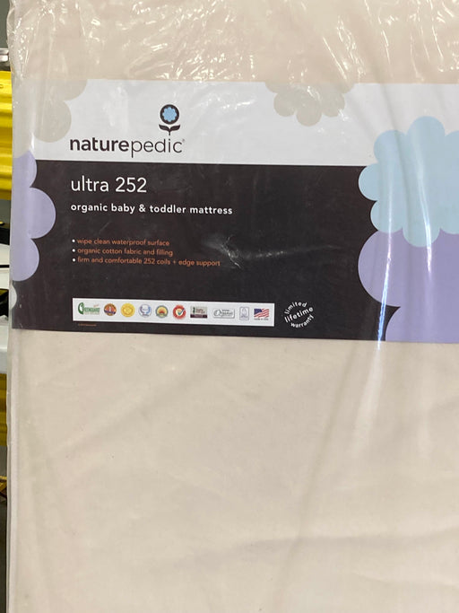 used Naturepedic Organic Breathable 252 Coil Baby & Toddler 2 Stage Mattress