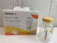 used Medela Milk Storage Bags, + Bottle