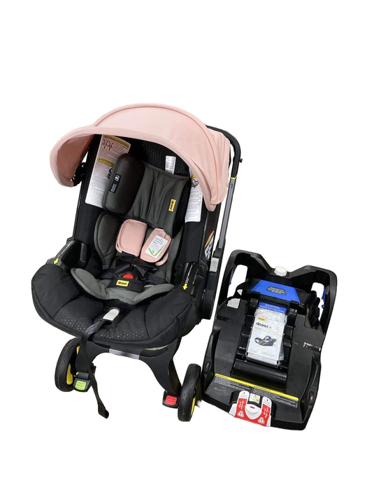 used Doona Infant Car Seat & Stroller Combo, 2022, Blush Pink