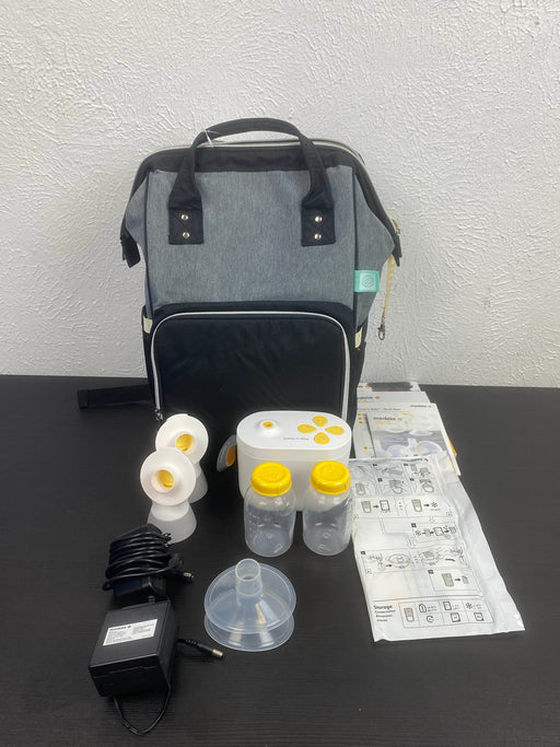 used Medela Pump In Style with MaxFlow, with Sydney Breast Pump Backpack-PLEASE REMOVE TUBING FROM LISTING