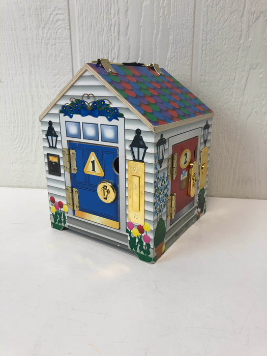 used Melissa & Doug Take-Along Wooden Doorbell Dollhouse