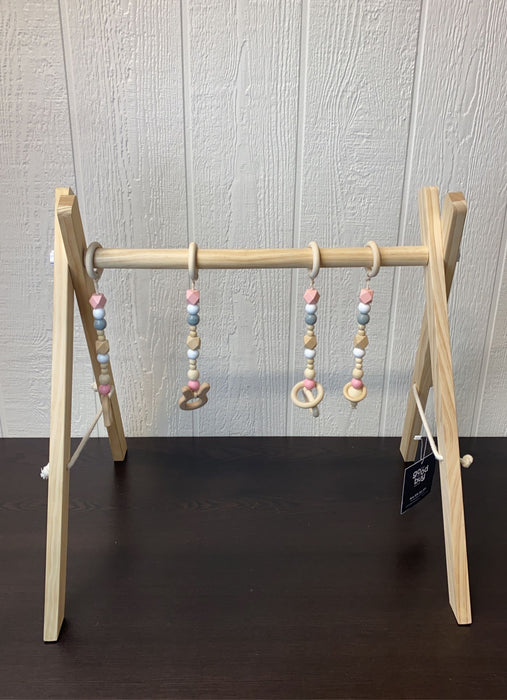 used Poppyseed Play Wooden Baby Gym